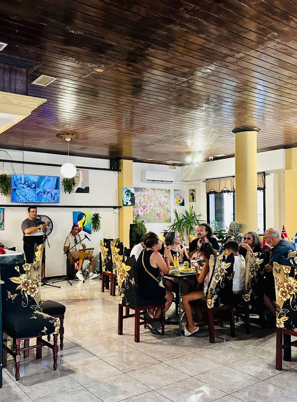 A band playing in the dining room at Salt n' Pepper